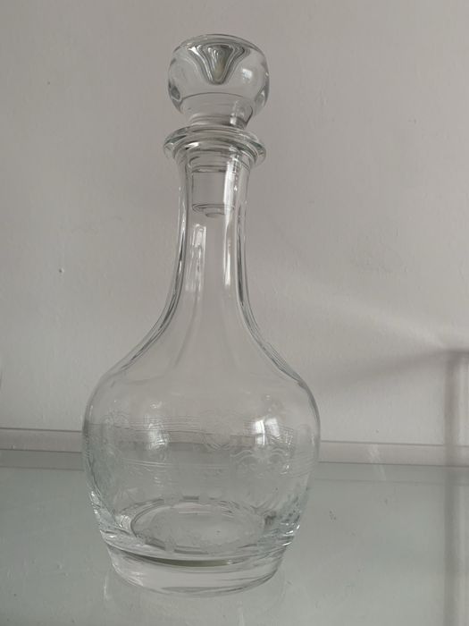 Quatro garrafas de vidro para  licores