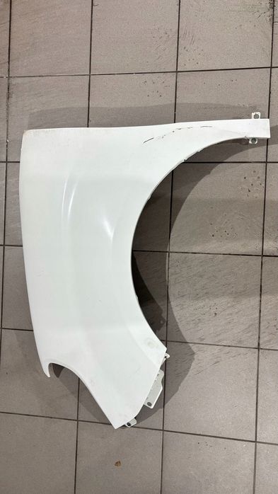 Błotnik Przód strona lewa Fiat Doblo