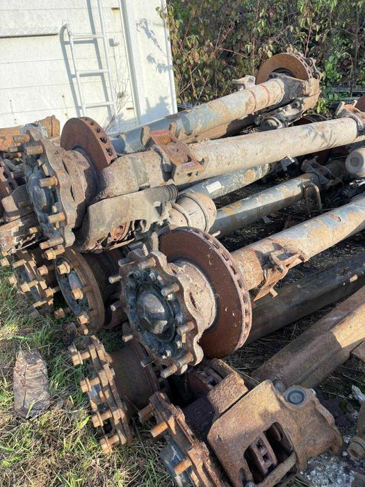 Вісі та ресори до напівпричипів