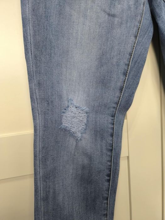 Spodnie jeansy wysoki stan skinny rurki dżinsy 10 M 38 szarpane nogawk