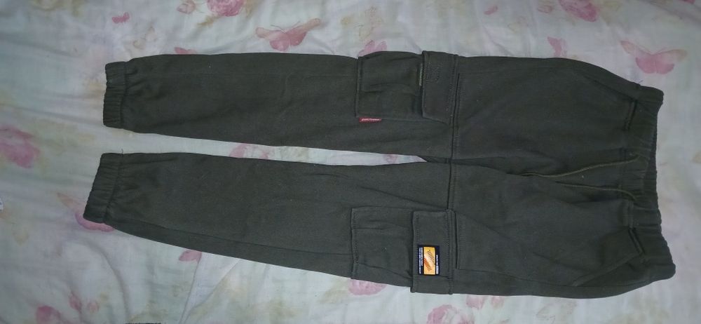 Штани на флісі темно зеленого кольору