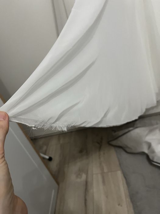 Suknia ślubna z długim rękawem