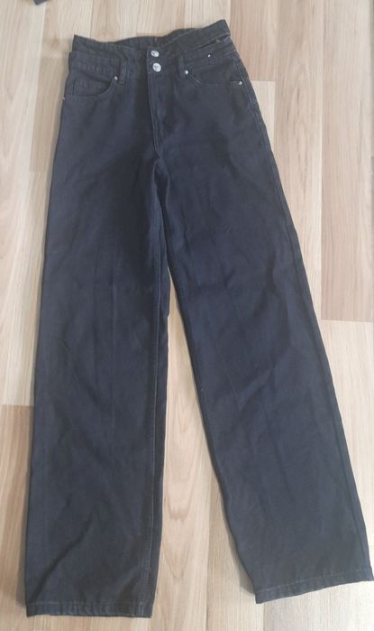 Nowe spodnie jeansowe dziewczęce.Rozm34.