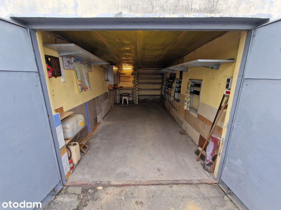 Garaż murowany w budynku z oświetleniem, w centrum, 15,4 m²