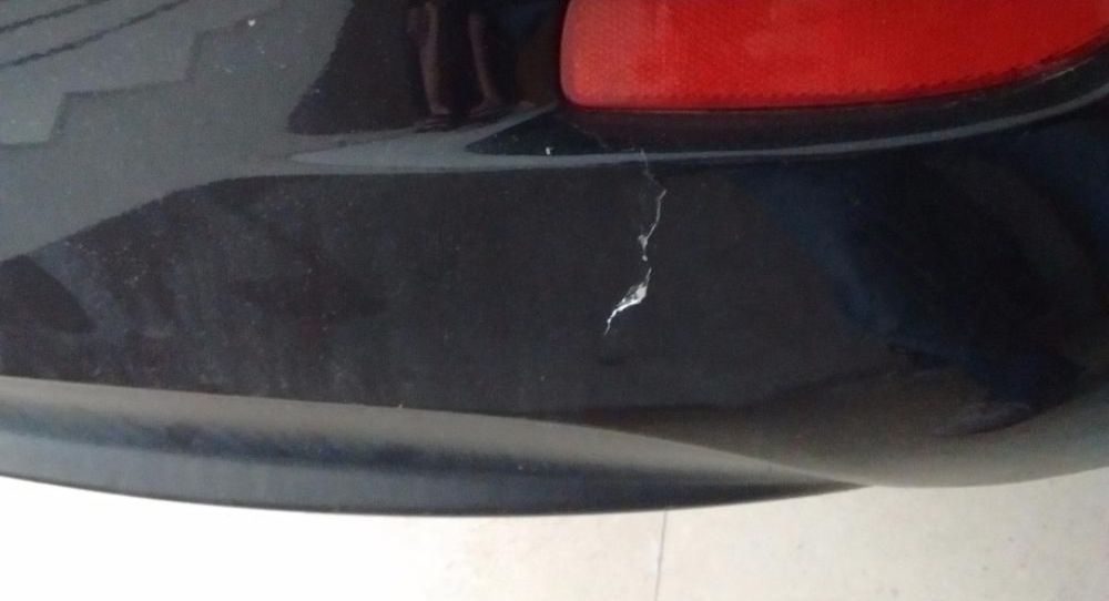 Pára-choques traseiro Mazda 3 (necessário pintura e reparação)