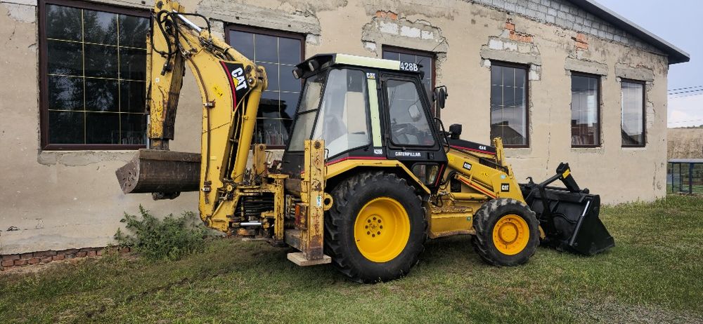 Sprzedam koparko ladowarka caterpillar cat 428b  4x4 pelna opcja