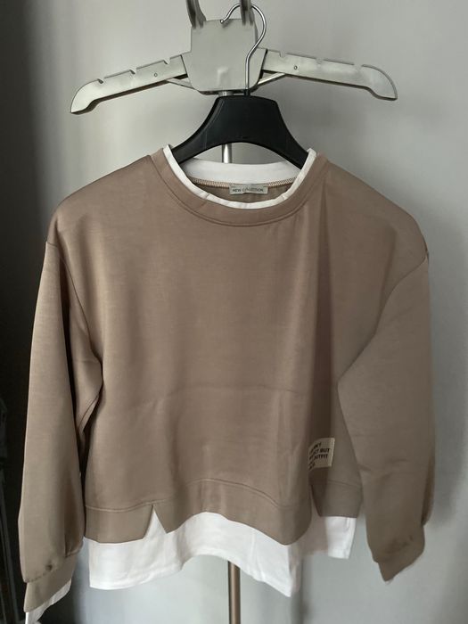 Beżowa bluza z białymi wypustkami