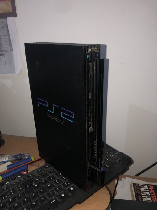 Selling PlayStation 2 with 2 Controllers + 8 Games + 8MB Memory Card64354216529539121