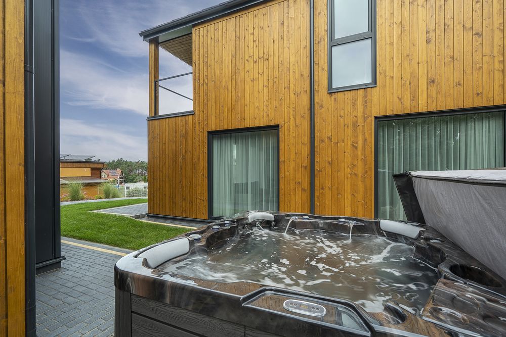 Domy całoroczne o podwyższonym standardzie z jacuzzi. 100m do plazy !