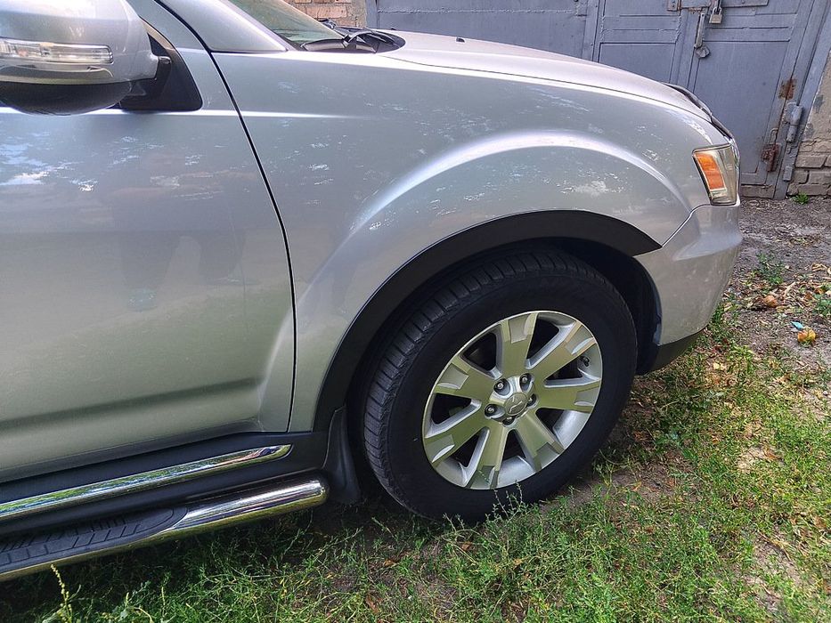 Mitsubishi Outlander 2006-2012 рр. Накладки на арки (4 шт, чорні)