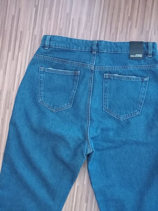Spodnie jeansowe Reserved 38