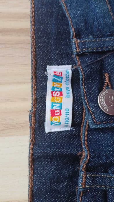 nowe z metką spodnie ciemny jeans 110/116