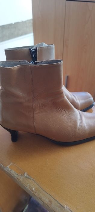 Botas castanhas pele