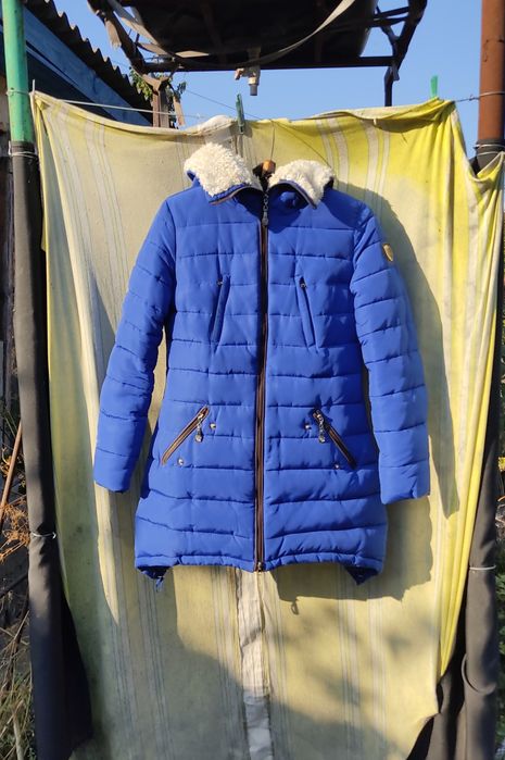 Теплюща жіноча куртка 46р