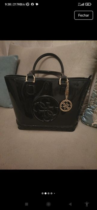Mala Guess preta original com acatamento brilhanye
