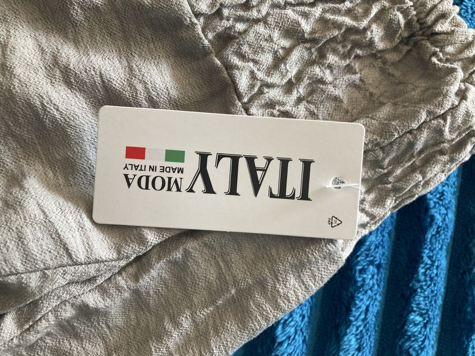 Zwiewne włoskie spodnie z szerokimi nogawkami