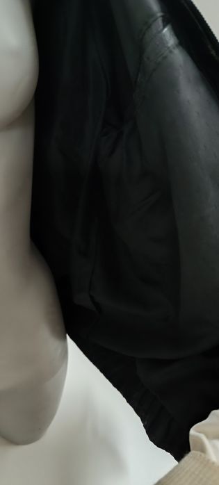 Black jacket, used. Size 50.64752274562818122