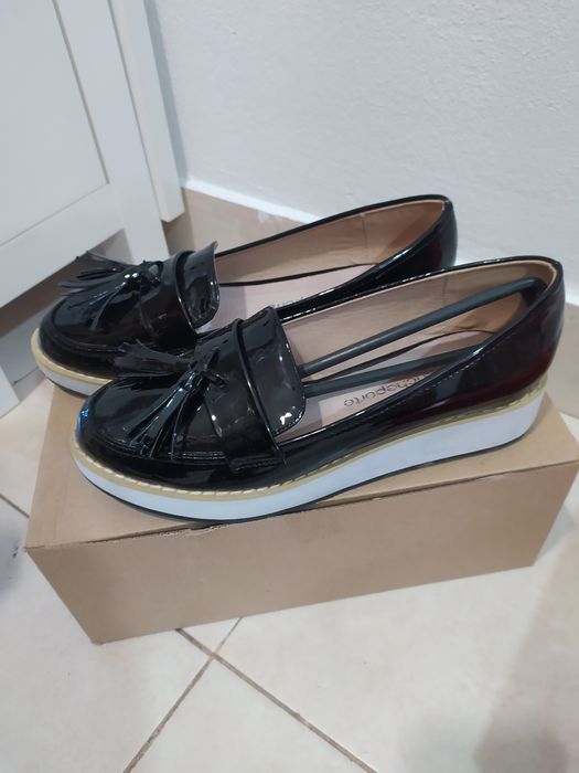 Botas em pele castanhas