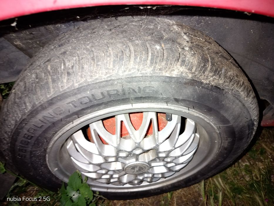 4 jantes 4x100 com peneus a meio rasto de Opel Corsa A medida 165.65.14