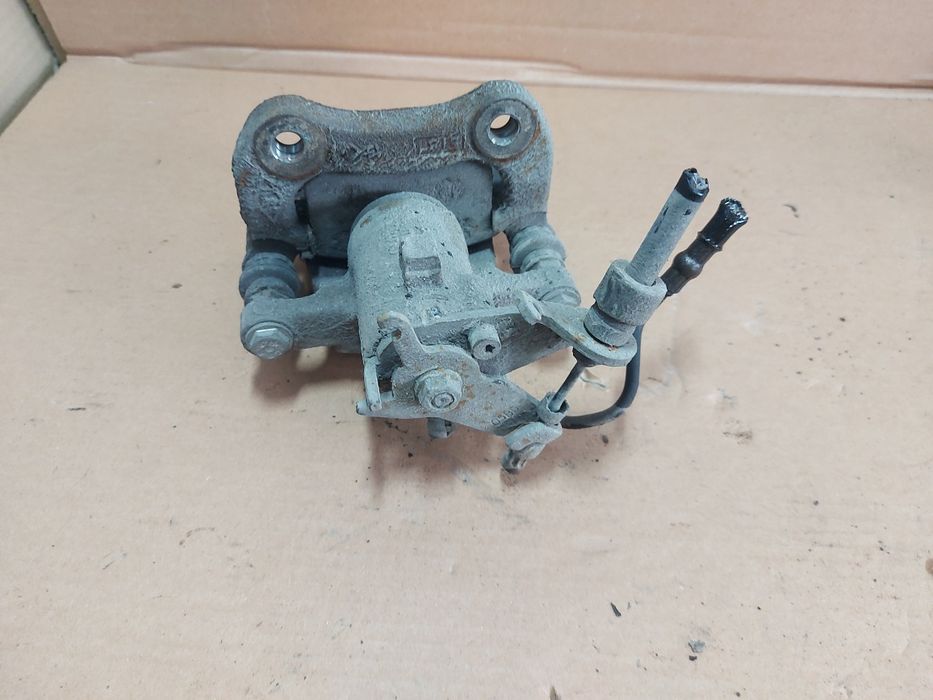 / Megane III 3 zacisk hamulcowy prawy tył