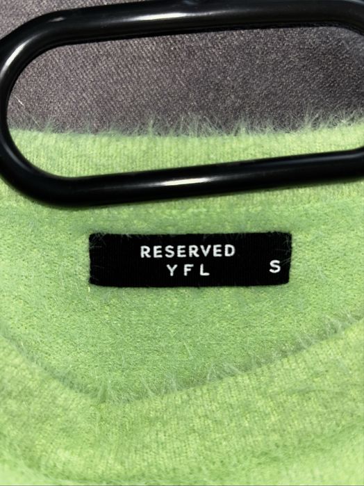 Zielony damski sweterek