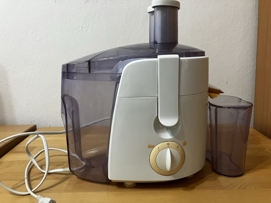 Соковитискач соковижималка соковыжималка Philips HR1851