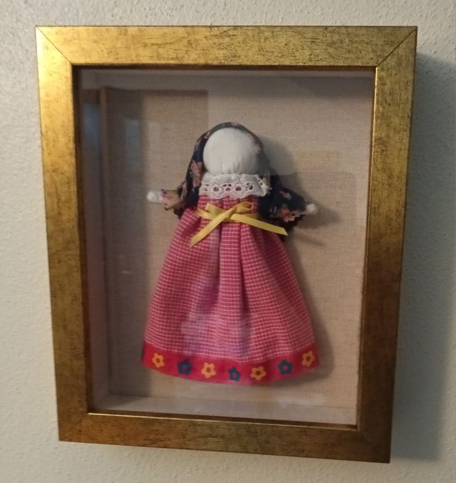 Quadro com boneca