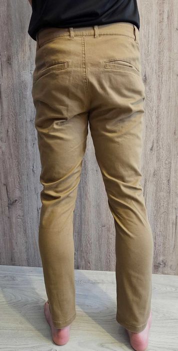 Sprzedam męskie spodnie CROPP Slim Fit w rozmiarze 30.