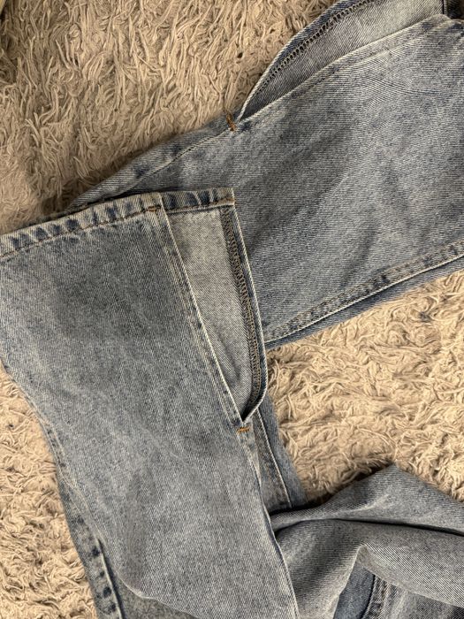 Джинси кокеткою кльош з розрізами