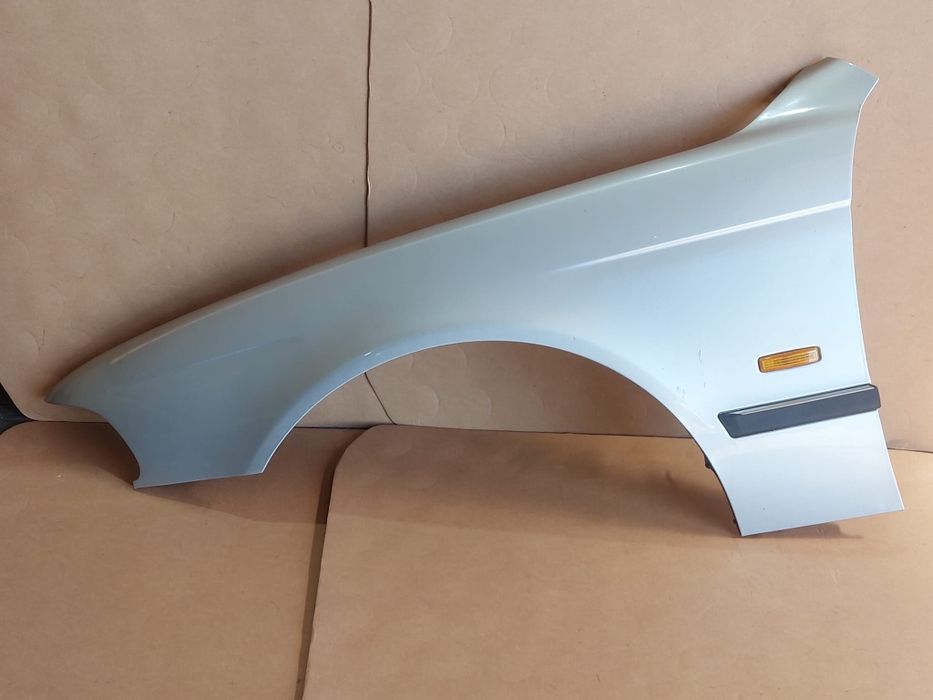 Guarda lamas esquerdo BMW e39