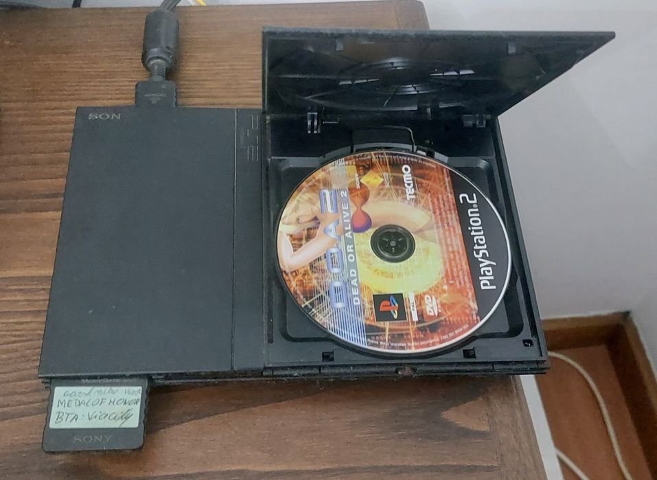 PS2 with Additional Games in Original Condition64729401033090122