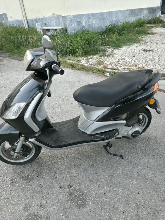 Piaggio fly 125 4 tempos muito económica