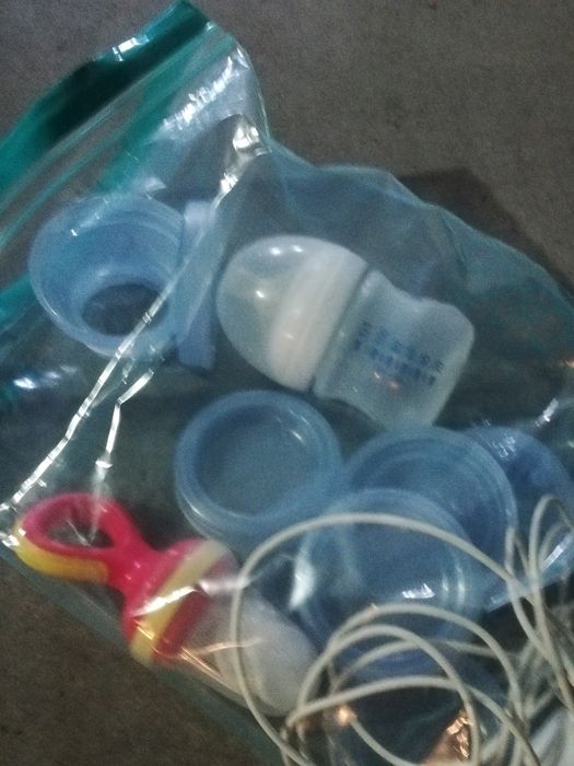 Aquecedor de biberões e bomba eléctrica de tirar leite