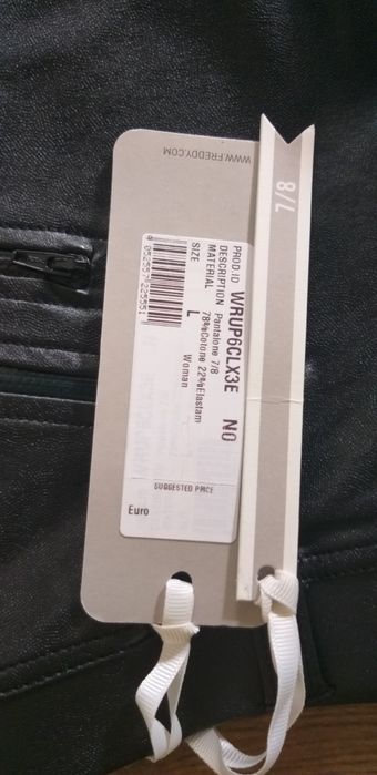 Spodnie Freedy.  Nowe L