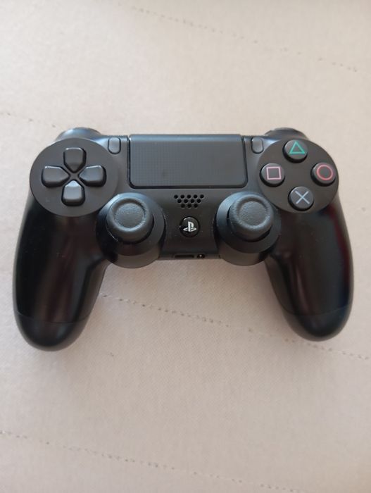 PS4 Slim 500gb, 5 jogos incluídos no preço. Cabos incluídos.PREÇO NEGOCIÁVEL. Excelente estado