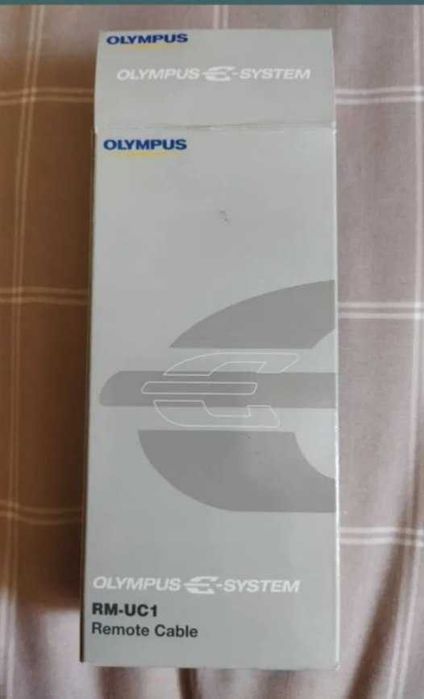 Vários Olympus (bcm-2,  grip HLD-4, RM-UC1)