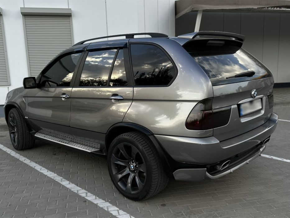 Комплект тюнинга накладки на арки юбка спойлер реснички BMW x5 e53