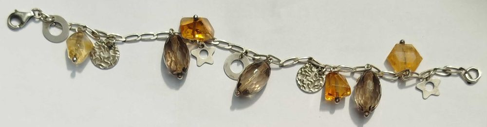 Srebrna (próba 925) bransoleta. 4 bursztyny. 3 sztuczne kamienie