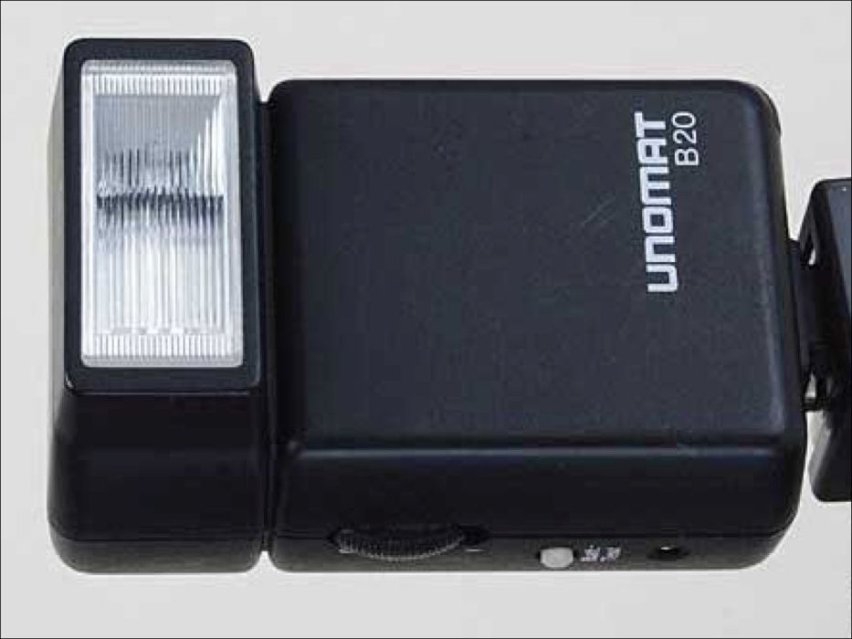 Flash / Iluminador UNOMAT B20 fixação universal p/máquina fotográfica.64584258835586121