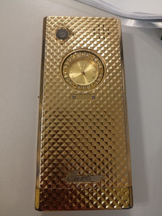 Телефон фирмы Cartier