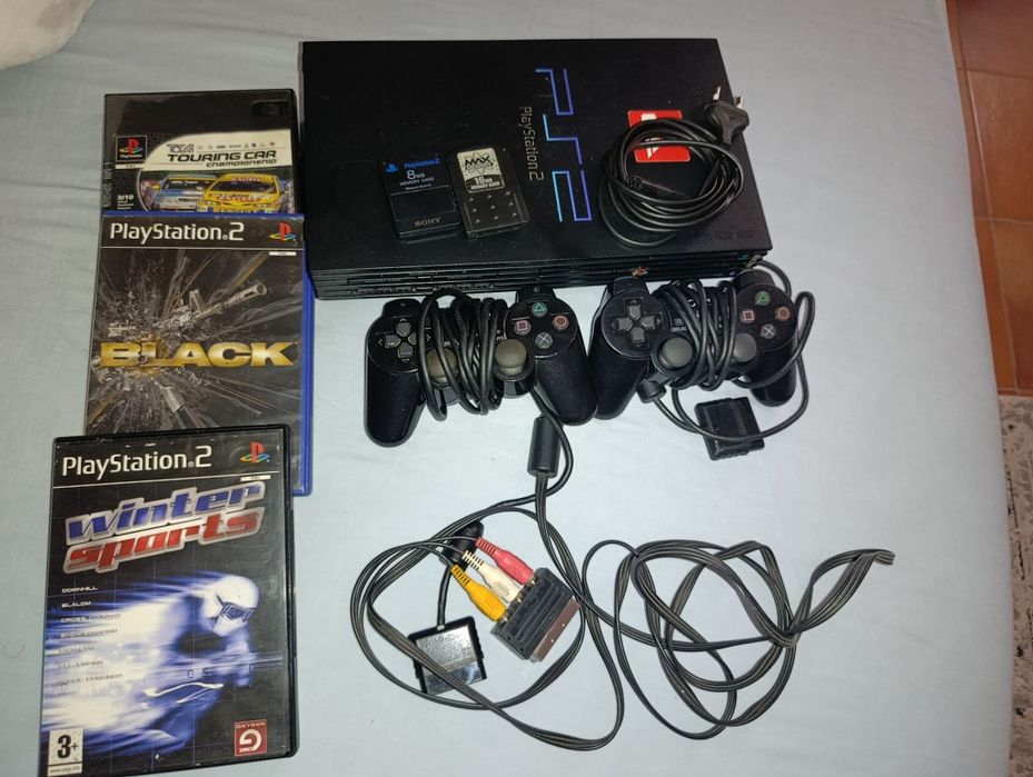 Ps2 com jogos e dois comandos originais