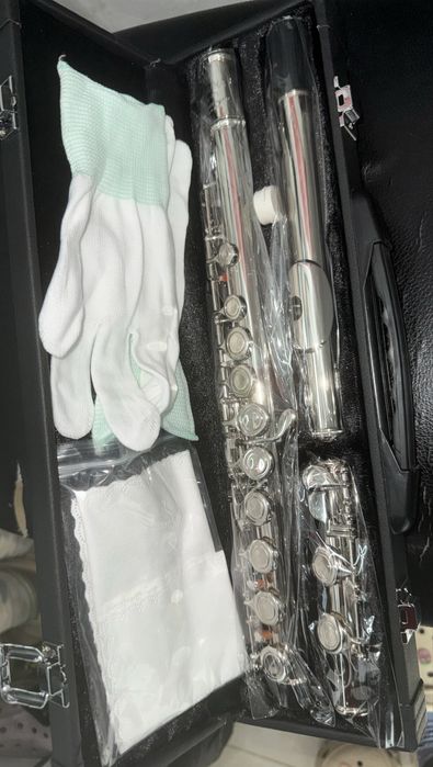 Продам нову поперечну флейту у строї С .