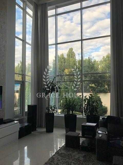 Продажа дома с ремонтом на Нивках 290 м2. бассейн, закритий КГ, охрана