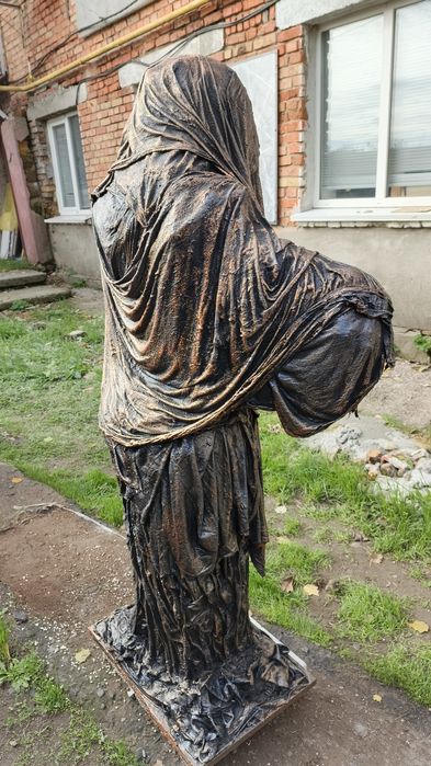 Декоративна садова статуя