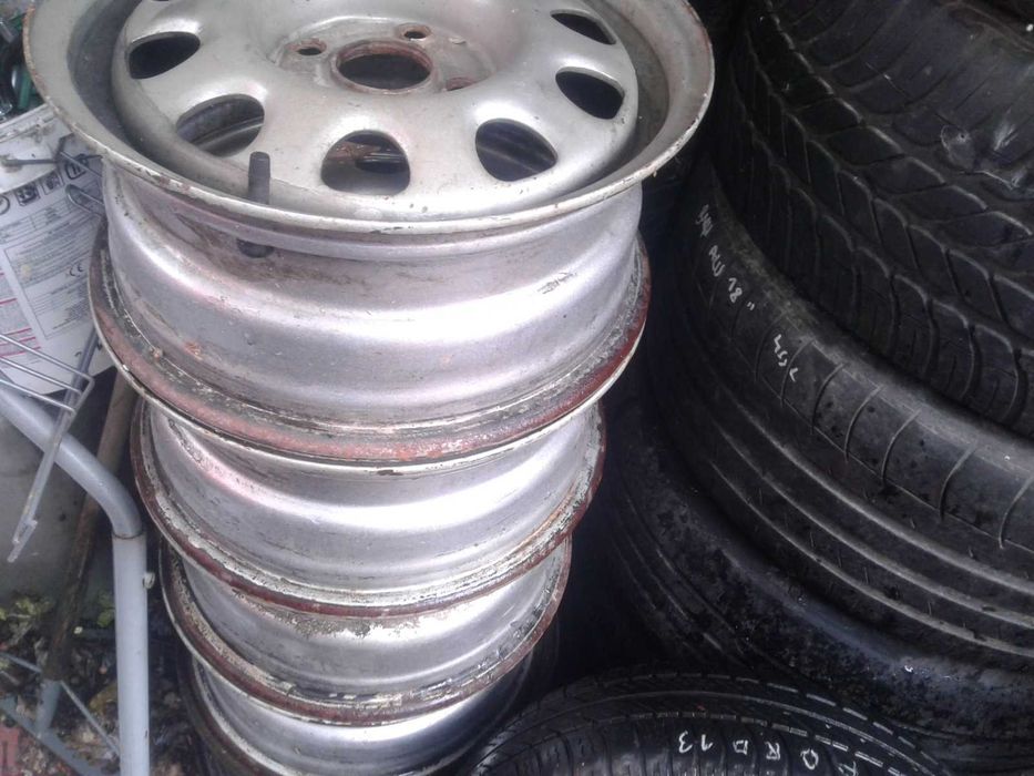 4 Flegi Stalowe VW 14 cali 4x100 ET45 Vento Golf 2 3 Passat B3 B4 Serc