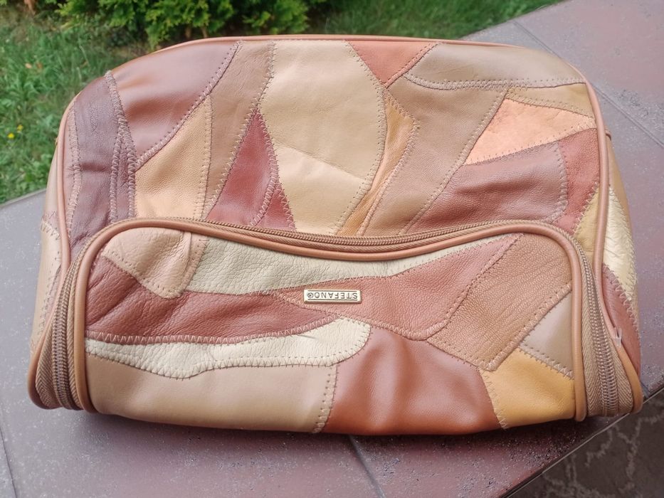 Pilnie ). Skórzana torebka Kosmetyczka