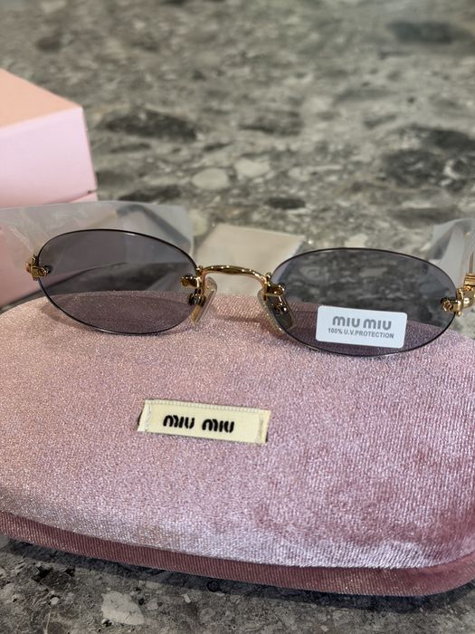 Сонцезахисні очки miu miu