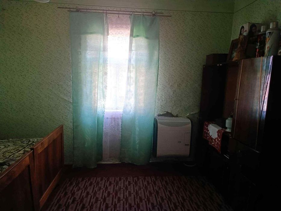 Продам дерев'яний будинок у с. Попелі.