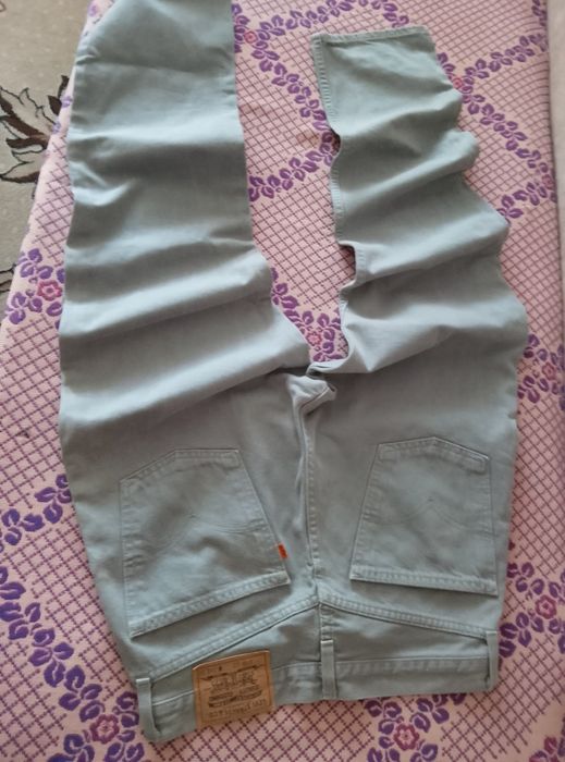Джинси чоловічі Levi's світло-сірого кольору W33 L32  дивіться заміри