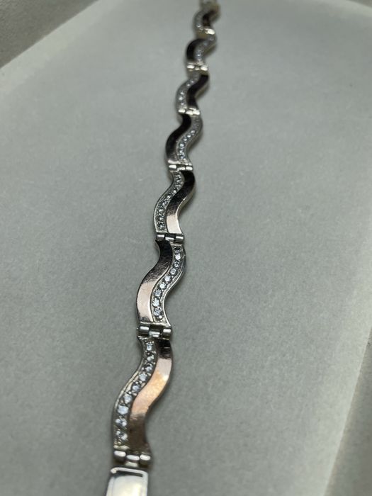 Продаю срібний браслет з золотими напайками